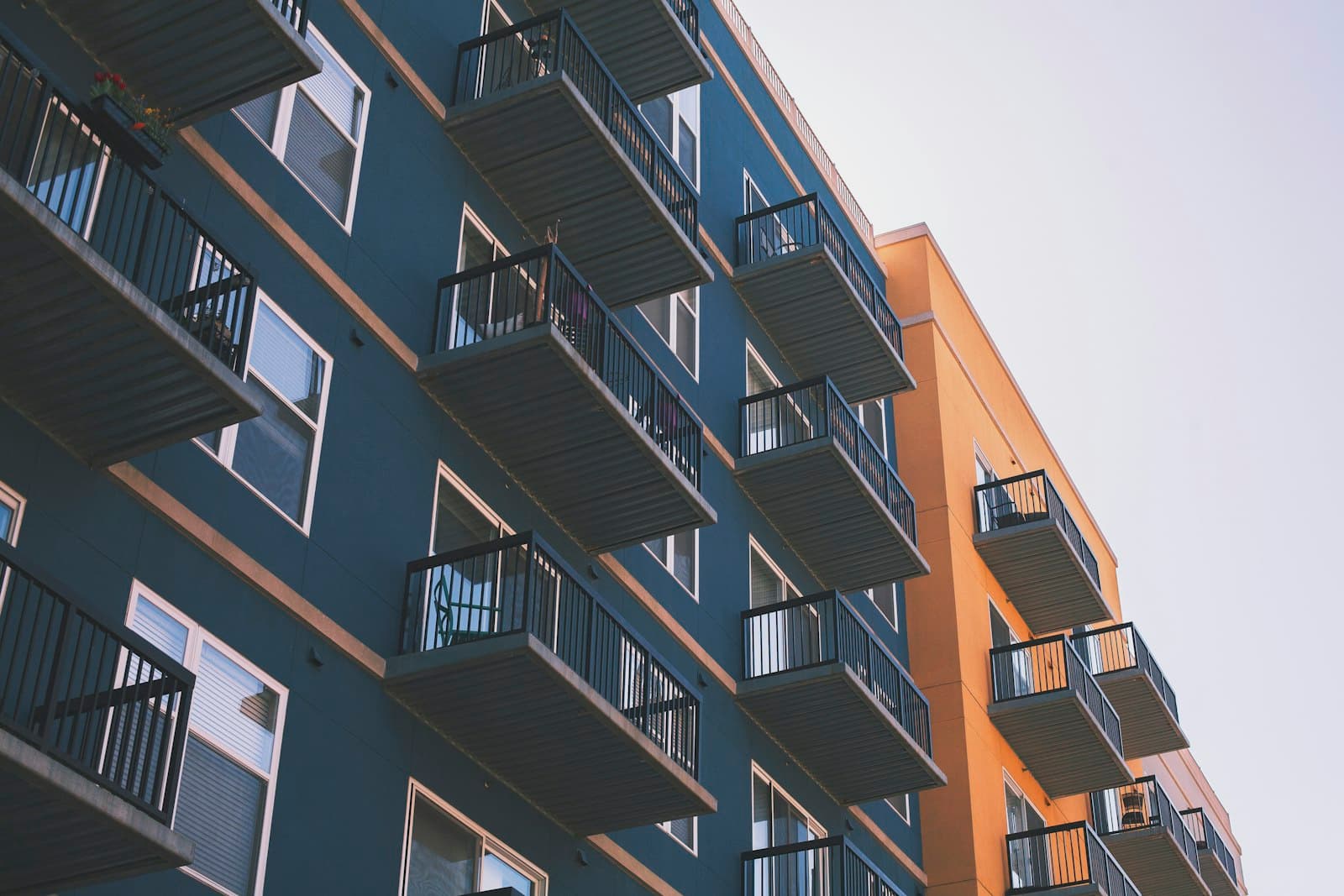Residential apartment building with rows of balconies